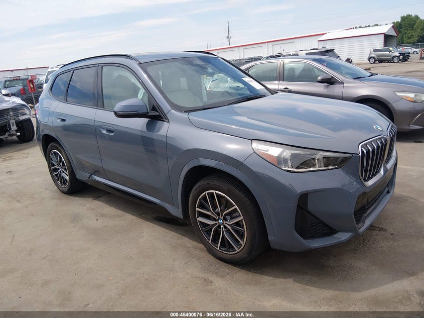 2023 BMW X1 VIN WBX73EF06P5W71974 IAAI salvage auction — SIDE, Salvage (North Carolina), sold $9,100 on 2026-08-22 (photo 1)