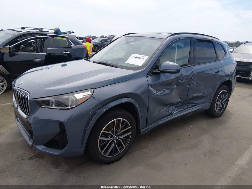 2023 BMW X1 VIN WBX73EF06P5W71974 IAAI salvage auction — SIDE, Salvage (North Carolina), sold $9,100 on 2026-08-22 (photo 2)