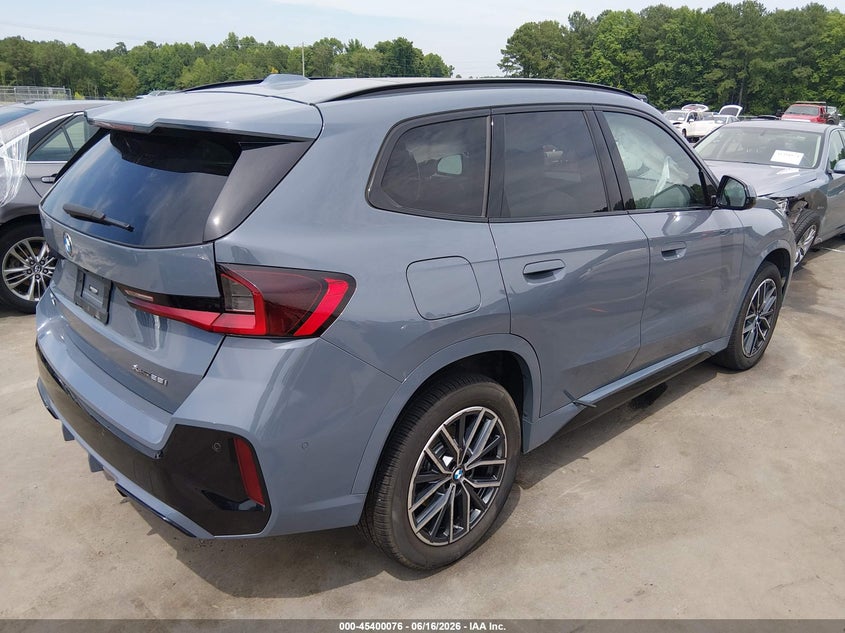 2023 BMW X1 VIN WBX73EF06P5W71974 IAAI salvage auction — SIDE, Salvage (North Carolina), sold $9,100 on 2026-08-22 (photo 4)