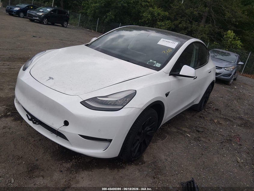 2021 Tesla Model y VIN 5YJYGDED9MF192785 IAAI salvage auction — UNKNOWN, Clear (Texas), sold $12,000 on 2026-07-08 (photo 2)