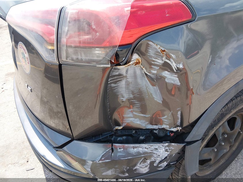 2017 Toyota Rav 4 VIN JTMZFREV2HJ106678 IAAI salvage auction — FRONT & REAR, Rebuildable (Florida), sold $4,800 on 2026-07-29 (photo 6)