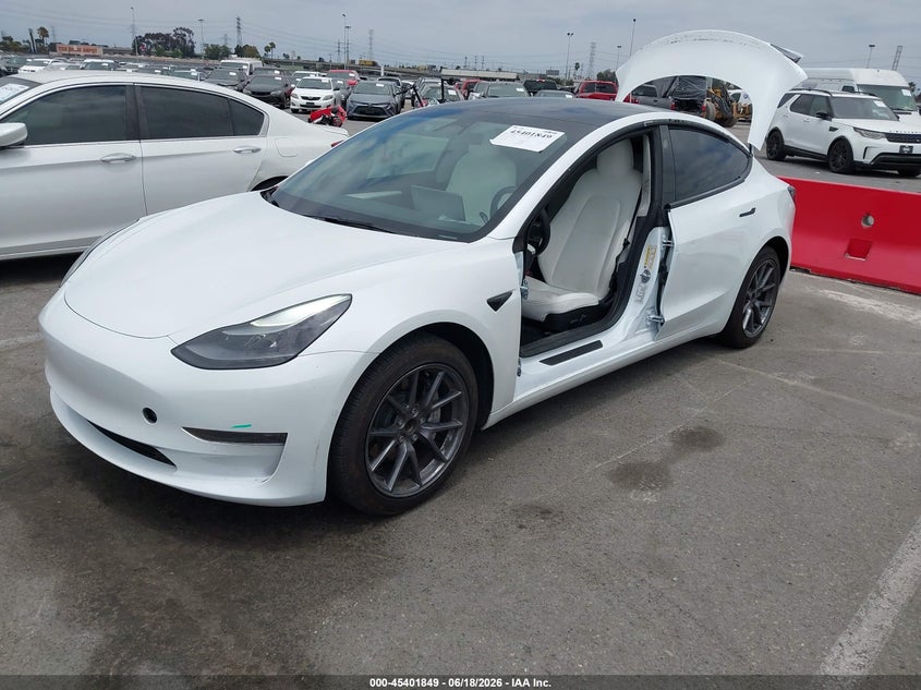 2022 Tesla Model 3 VIN 5YJ3E1EA2NF357954 IAAI salvage auction — SIDE, Salvage (California), sold $9,800 on 2026-07-08 (photo 2)