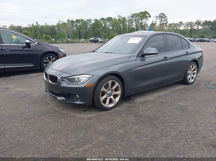 2013 BMW 3 series VIN WBA3A9C58DF475286 IAAI salvage auction — NORMAL WEAR, Clear (Florida), sold $1,650 on 2026-07-14 (photo 2)