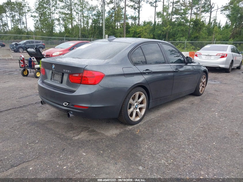 2013 BMW 3 series VIN WBA3A9C58DF475286 IAAI salvage auction — NORMAL WEAR, Clear (Florida), sold $1,650 on 2026-07-14 (photo 4)