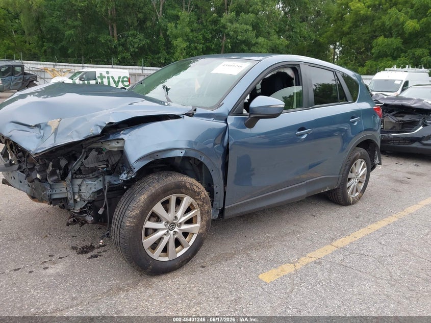 2016 Mazda Cx-5 VIN JM3KE4CY1G0611546 IAAI salvage auction — FRONT & REAR, Clear (Michigan), sold $1,200 on 2026-07-09 (photo 2)