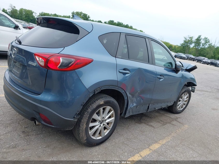 2016 Mazda Cx-5 VIN JM3KE4CY1G0611546 IAAI salvage auction — FRONT & REAR, Clear (Michigan), sold $1,200 on 2026-07-09 (photo 4)
