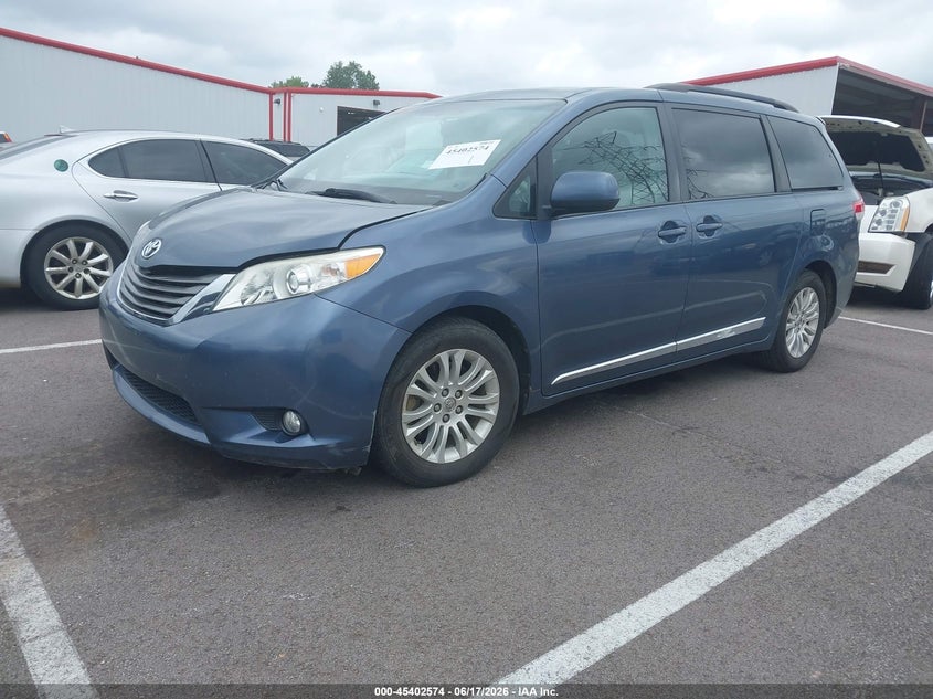 2014 Toyota Sienna VIN 5TDYK3DC7ES418109 IAAI salvage auction — LEFT FRONT, Clear (Tennessee), sold $3,300 on 2026-07-14 (photo 2)