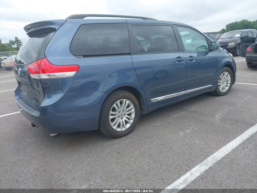 2014 Toyota Sienna VIN 5TDYK3DC7ES418109 IAAI salvage auction — LEFT FRONT, Clear (Tennessee), sold $3,300 on 2026-07-14 (photo 4)