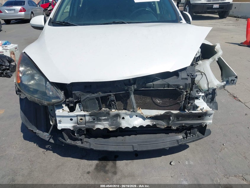 2011 Mazda 2 VIN JM1DE1HZ5B0101792 IAAI salvage auction — NORMAL WEAR, Salvage (Texas), sold $25 on 2026-07-29 (photo 6)