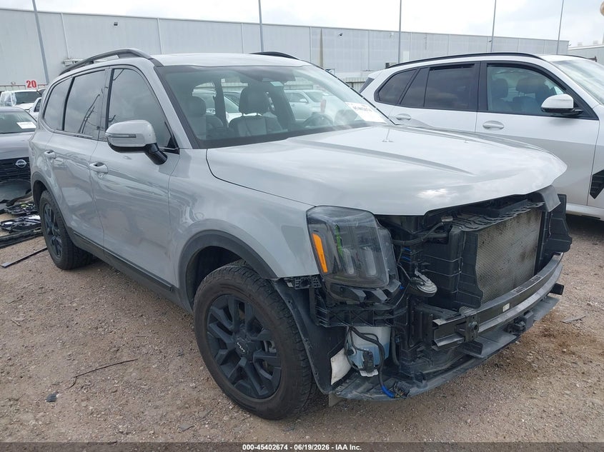 2024 Kia Telluride VIN 5XYP5DGC9RG496317 IAAI salvage auction — LEFT SIDE, Salvage Title, sold $12,000 on 2026-08-27 (photo 1)