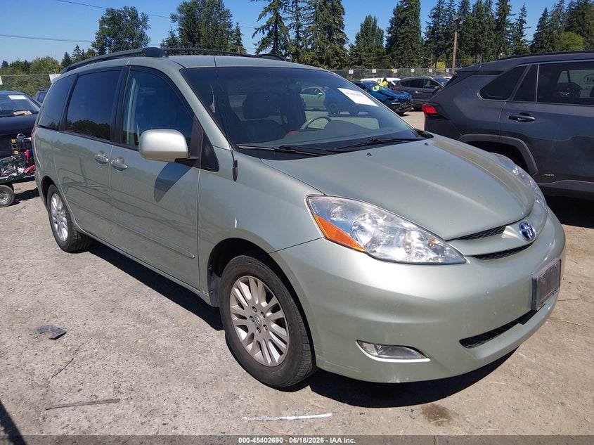 2009 Toyota Sienna VIN 5TDZK22C39S261332 IAAI salvage auction — SIDE, Bill Of Sale (Washington), sold $1,050 on 2026-07-22 (photo 1)
