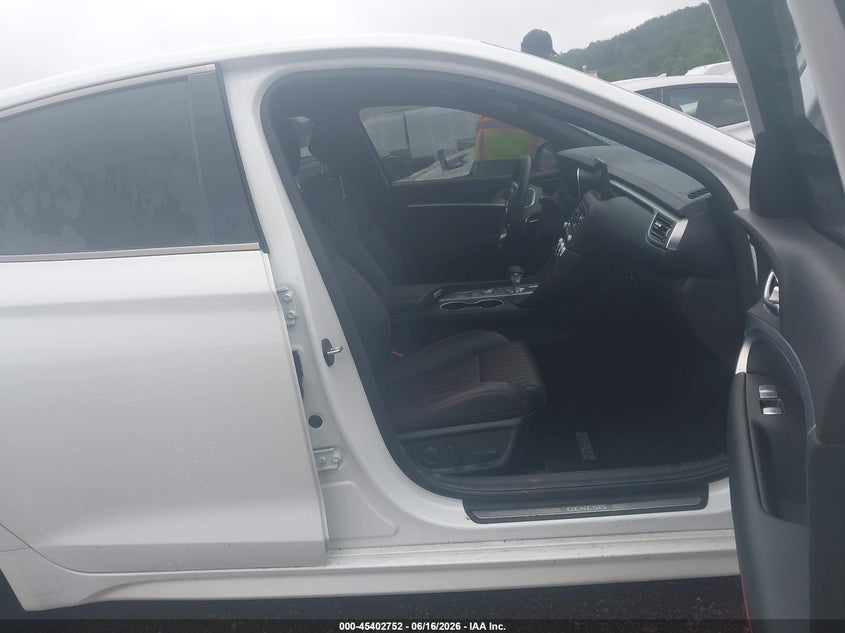 2023 Genesis G70 VIN KMTG34TA7PU106256 IAAI salvage auction — UNKNOWN, Salvage Title, sold $10,900 on 2026-08-19 (photo 5)
