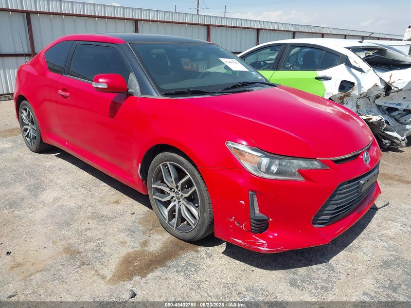 2014 Scion Tc VIN JTKJF5C79E3079787 IAAI salvage auction — NORMAL WEAR, Clear (Montana), sold $550 on 2026-07-21 (photo 1)