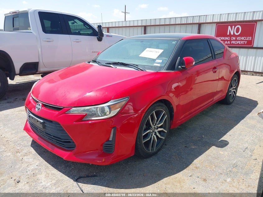 2014 Scion Tc VIN JTKJF5C79E3079787 IAAI salvage auction — NORMAL WEAR, Clear (Montana), sold $550 on 2026-07-21 (photo 2)