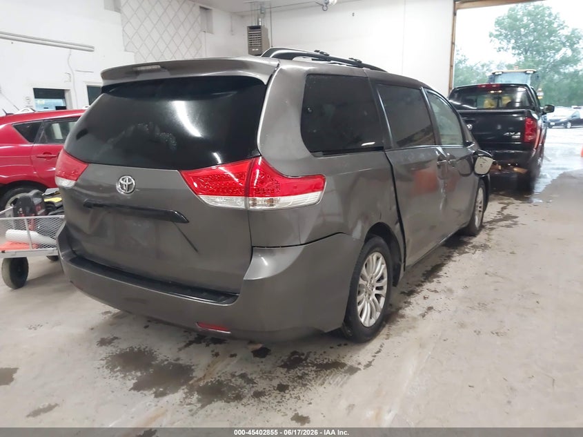 2012 Toyota Sienna VIN 5TDYK3DC2CS275650 IAAI salvage auction — SIDE, Salvage (Iowa), sold $1,050 on 2026-07-29 (photo 4)