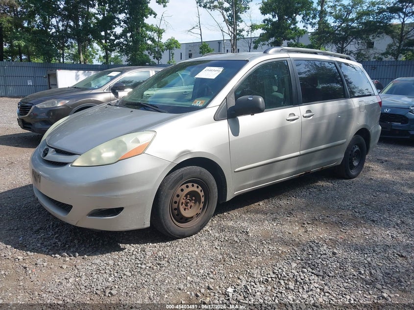 2006 Toyota Sienna VIN 5TDZA23C16S523717 IAAI salvage auction — FRONT & REAR, Clear (New Jersey), sold $950 on 2026-07-12 (photo 2)