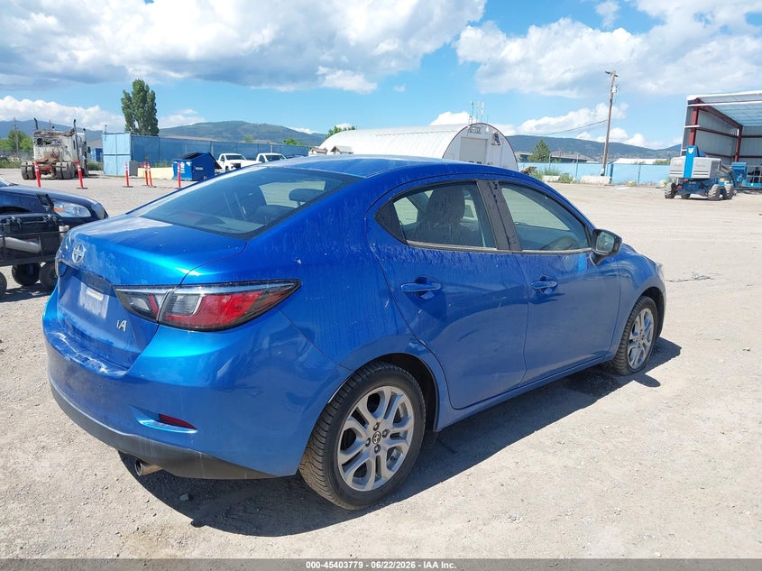 2016 Scion Ia VIN 3MYDLBZV5GY139464 IAAI salvage auction — SIDE, Salvage (Montana), sold $2,250 on 2026-07-29 (photo 4)