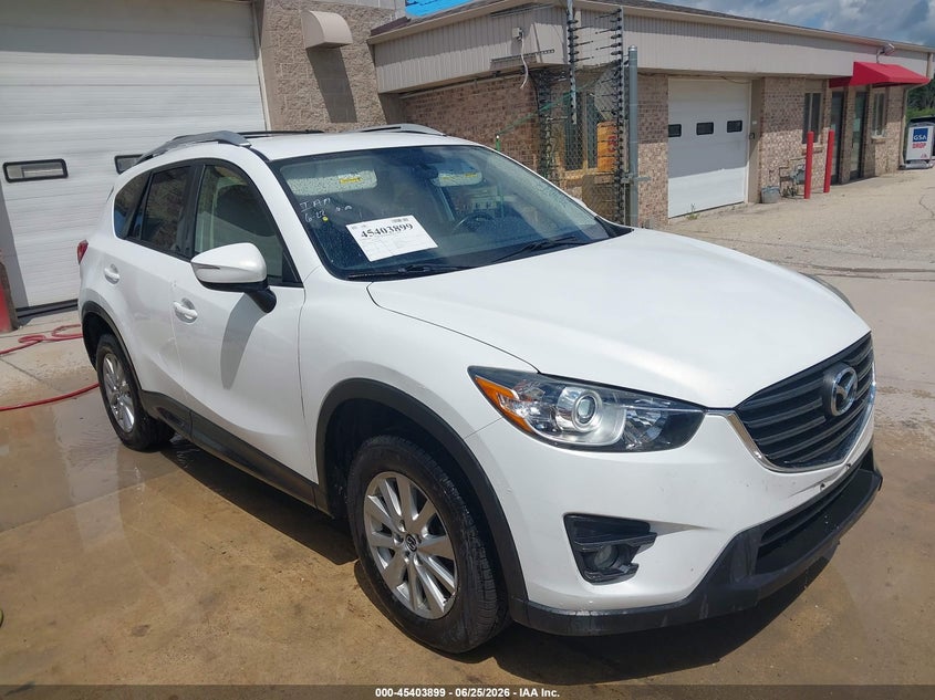 2016 Mazda Cx-5 VIN JM3KE4CYXG0864073 IAAI salvage auction — NORMAL WEAR, Clear-Endorsement (Wisconsin), sold $4,950 on 2026-07-14 (photo 1)