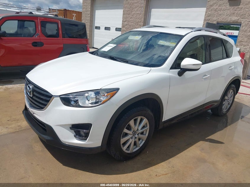 2016 Mazda Cx-5 VIN JM3KE4CYXG0864073 IAAI salvage auction — NORMAL WEAR, Clear-Endorsement (Wisconsin), sold $4,950 on 2026-07-14 (photo 2)