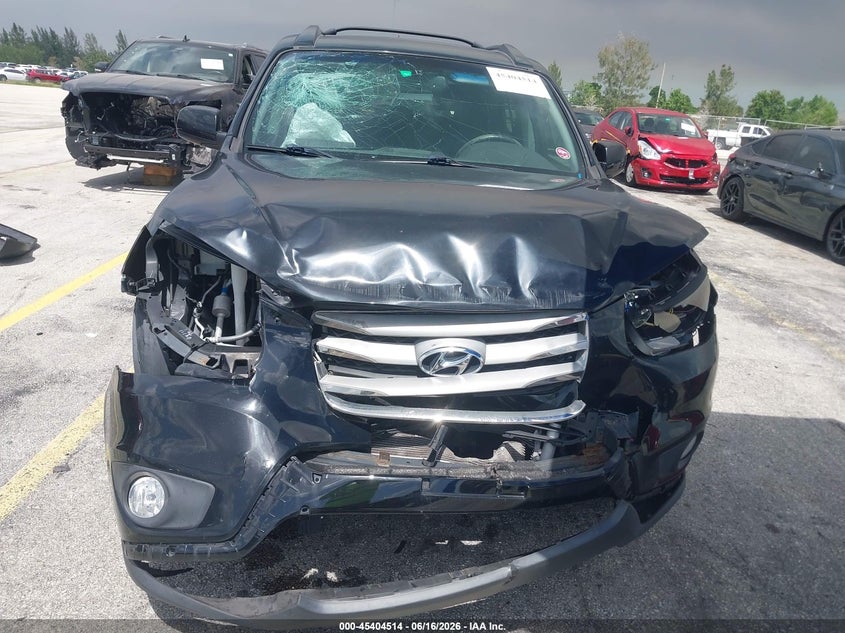 2012 Hyundai Santa fe VIN 5XYZK3AB5CG159596 IAAI salvage auction — NORMAL WEAR, Clear (Florida), sold $1,125 on 2026-07-16 (photo 6)