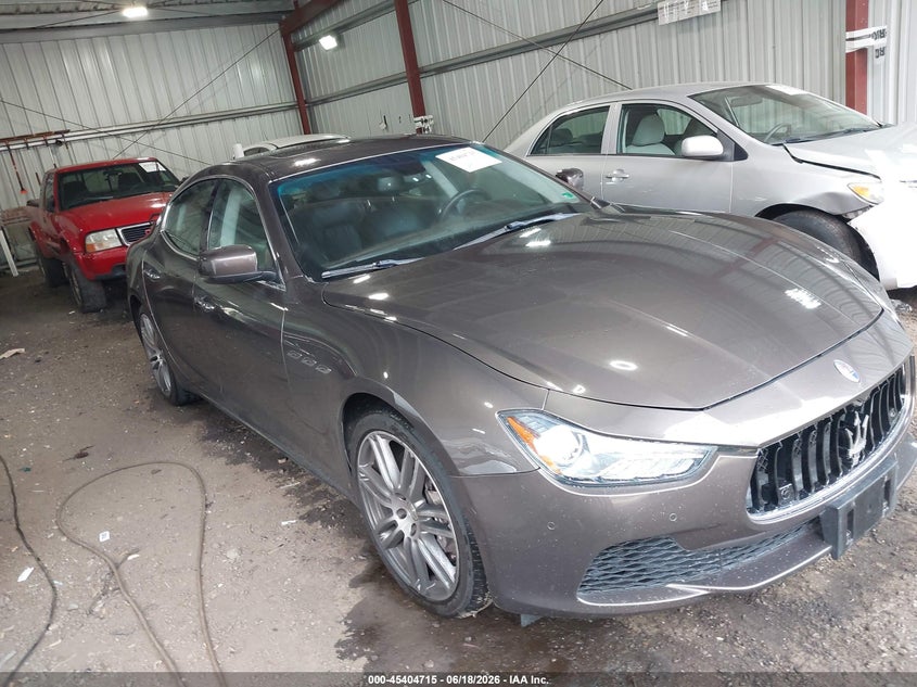2014 Maserati Ghibli VIN ZAM57XSA2E1127894 IAAI salvage auction — LEFT SIDE, Salvage (Virginia), sold $3,950 on 2026-07-09 (photo 1)