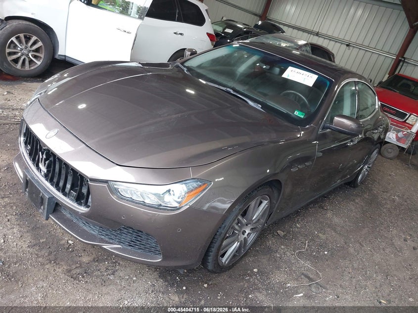2014 Maserati Ghibli VIN ZAM57XSA2E1127894 IAAI salvage auction — LEFT SIDE, Salvage (Virginia), sold $3,950 on 2026-07-09 (photo 2)
