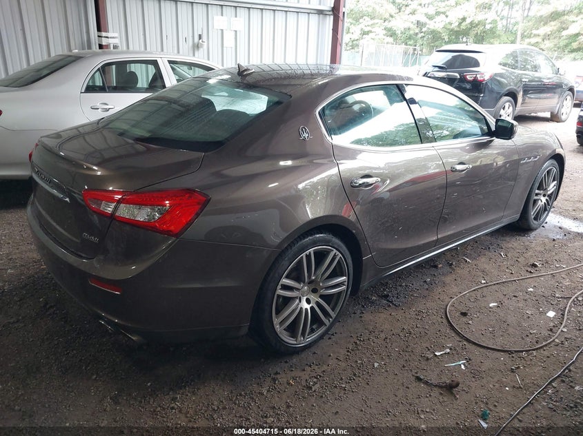 2014 Maserati Ghibli VIN ZAM57XSA2E1127894 IAAI salvage auction — LEFT SIDE, Salvage (Virginia), sold $3,950 on 2026-07-09 (photo 4)