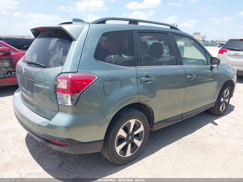 2018 Subaru Forester VIN JF2SJARC7JH517812 IAAI salvage auction — LEFT SIDE, Salvage Title, sold $1,725 on 2026-08-24 (photo 4)