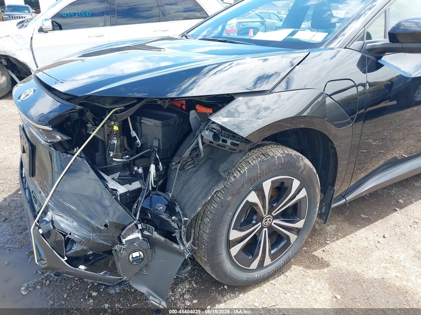 2025 Toyota Bz4x VIN JTMABACA1SA104227 IAAI salvage auction — LEFT FRONT, Salvage Title, sold $9,575 on 2026-08-13 (photo 6)