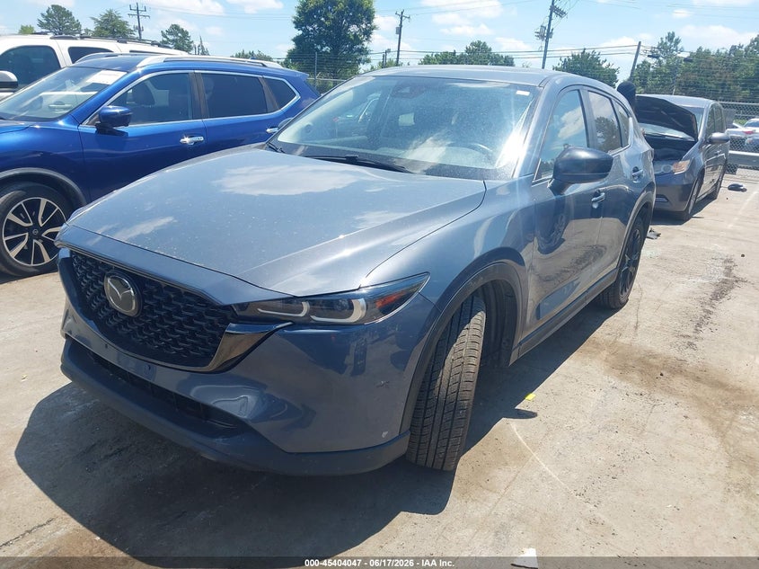 2023 Mazda Cx-5 VIN JM3KFBCM7P0191175 IAAI salvage auction — SIDE, Salvage Title, sold $8,950 on 2026-07-20 (photo 2)