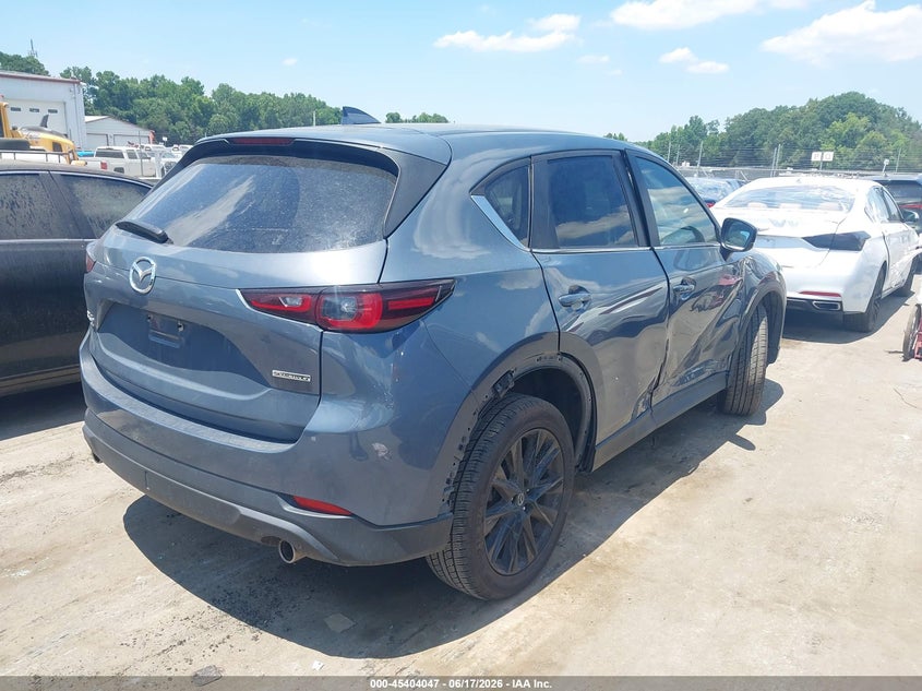 2023 Mazda Cx-5 VIN JM3KFBCM7P0191175 IAAI salvage auction — SIDE, Salvage Title, sold $8,950 on 2026-07-20 (photo 4)