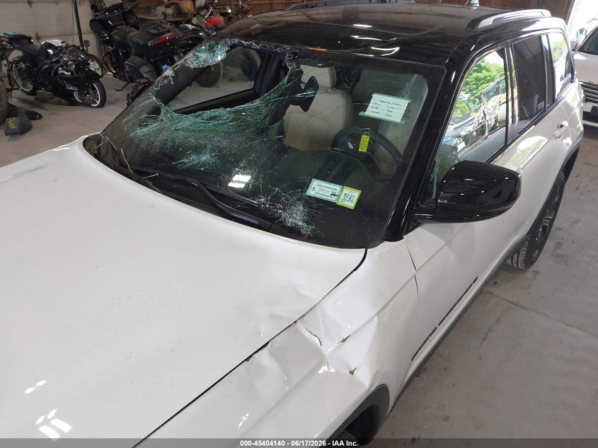 2025 Jeep Grand cherokee VIN 1C4RJHBG0S8795987 IAAI salvage auction — STORM DAMAGE, Salvage Title, sold $20,250 on 2026-09-16 (photo 6)