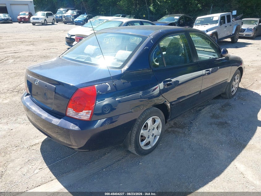 2004 Hyundai Elantra VIN KMHDN46D54U817494 IAAI salvage auction — LEFT SIDE, Salvage (Indiana), sold $325 on 2026-07-15 (photo 4)
