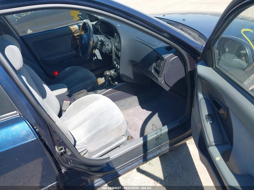 2004 Hyundai Elantra VIN KMHDN46D54U817494 IAAI salvage auction — LEFT SIDE, Salvage (Indiana), sold $325 on 2026-07-15 (photo 5)