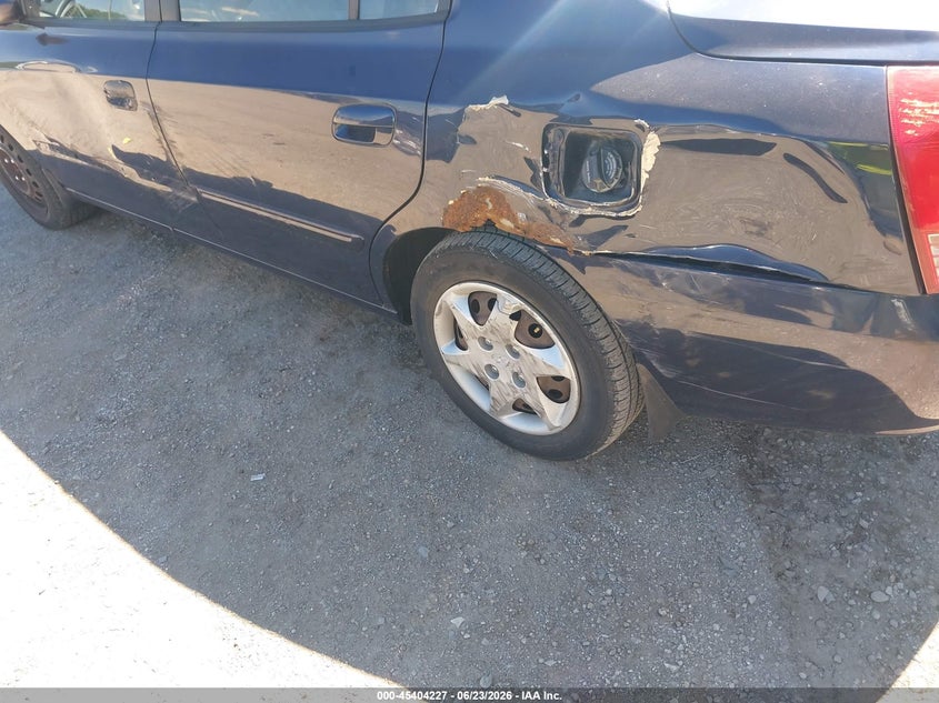 2004 Hyundai Elantra VIN KMHDN46D54U817494 IAAI salvage auction — LEFT SIDE, Salvage (Indiana), sold $325 on 2026-07-15 (photo 6)