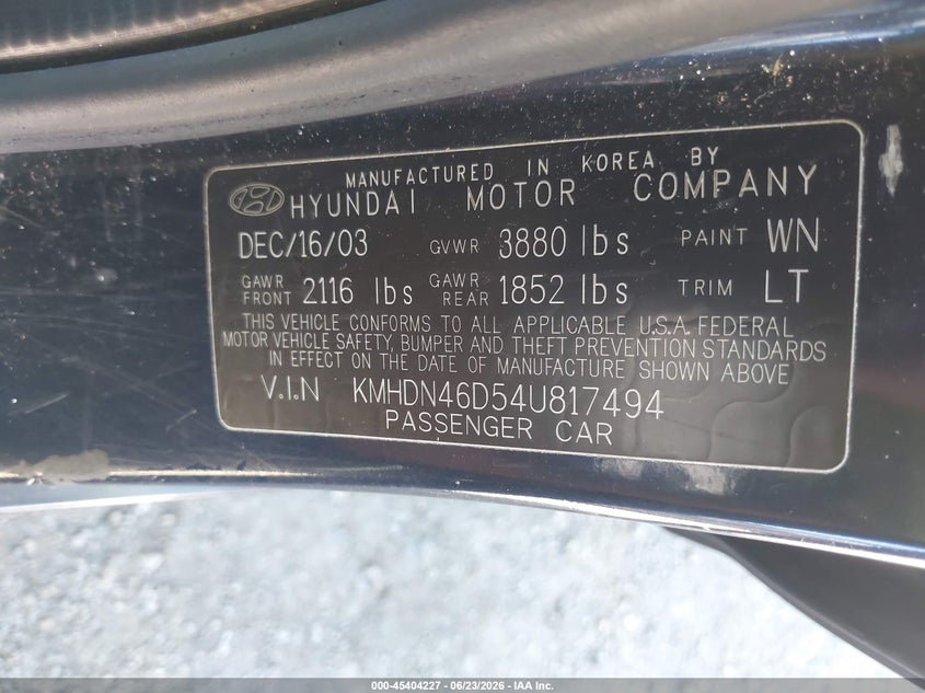 2004 Hyundai Elantra VIN KMHDN46D54U817494 IAAI salvage auction — LEFT SIDE, Salvage (Indiana), sold $325 on 2026-07-15 (photo 9)