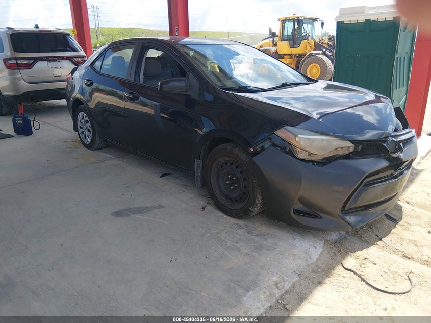 2018 Toyota Corolla VIN 5YFBURHE2JP766711 IAAI salvage auction — FRONT END, Rebuildable (Florida), sold $2,500 on 2026-07-14 (photo 1)