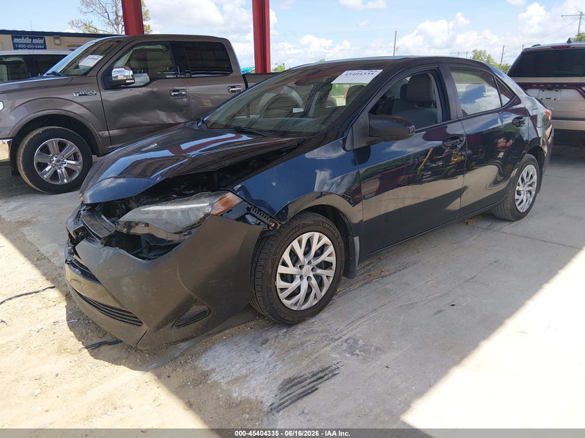 2018 Toyota Corolla VIN 5YFBURHE2JP766711 IAAI salvage auction — FRONT END, Rebuildable (Florida), sold $2,500 on 2026-07-14 (photo 2)
