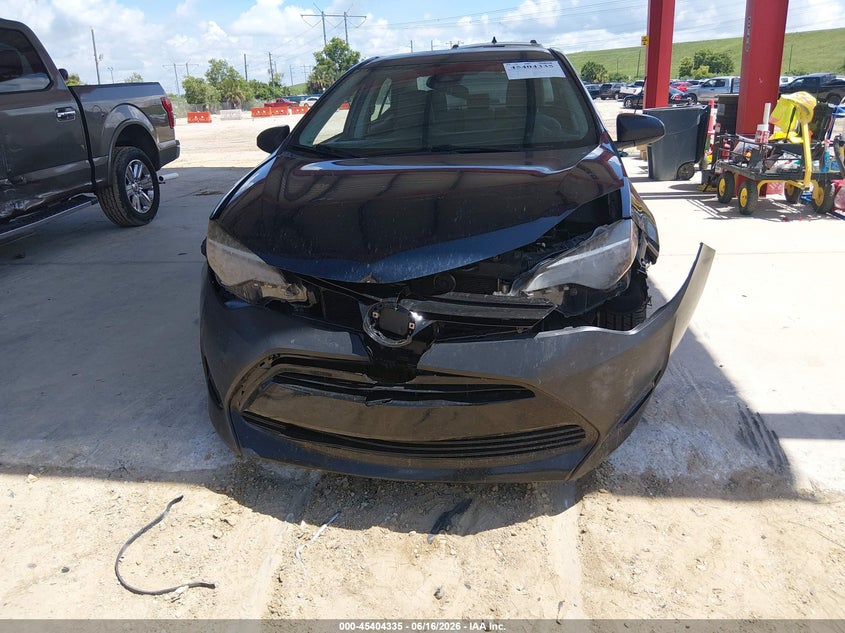 2018 Toyota Corolla VIN 5YFBURHE2JP766711 IAAI salvage auction — FRONT END, Rebuildable (Florida), sold $2,500 on 2026-07-14 (photo 6)