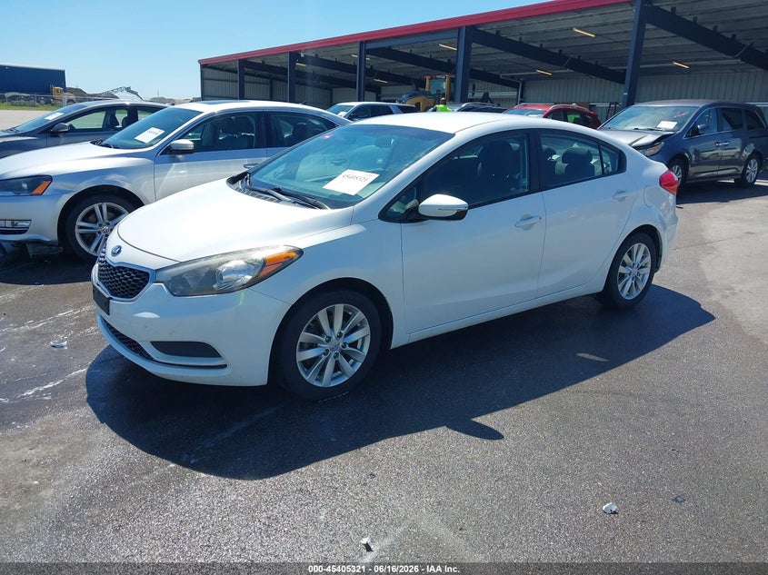 2016 Kia Forte VIN KNAFX4A63G5506819 IAAI salvage auction — SIDE, Salvage (Kansas), sold $800 on 2026-07-09 (photo 2)