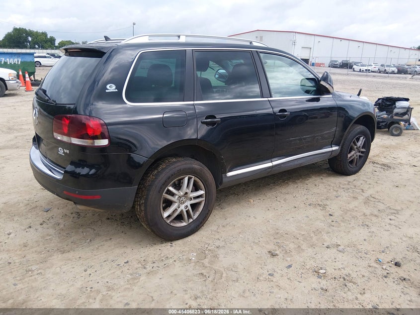 2009 Volkswagen Touareg VIN WVGBE77L09D001850 IAAI salvage auction — SIDE, Salvage (Georgia), sold $625 on 2026-07-16 (photo 4)