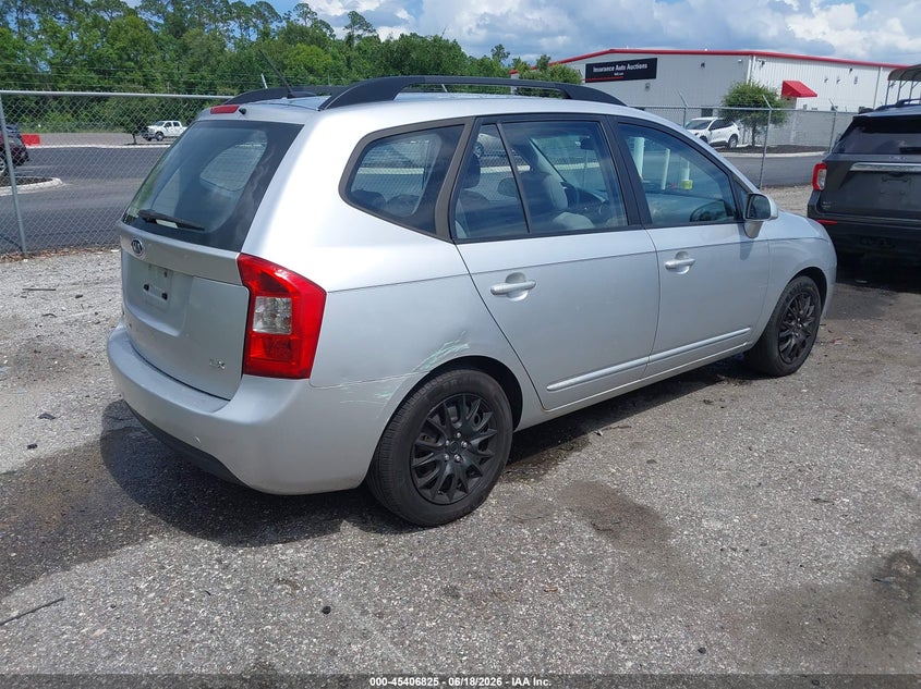 2009 Kia Rondo VIN KNAFG528597246405 IAAI salvage auction — SIDE, Rebuildable (Florida), sold $400 on 2026-07-14 (photo 4)