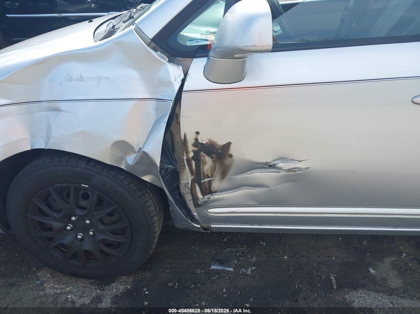 2009 Kia Rondo VIN KNAFG528597246405 IAAI salvage auction — SIDE, Rebuildable (Florida), sold $400 on 2026-07-14 (photo 6)