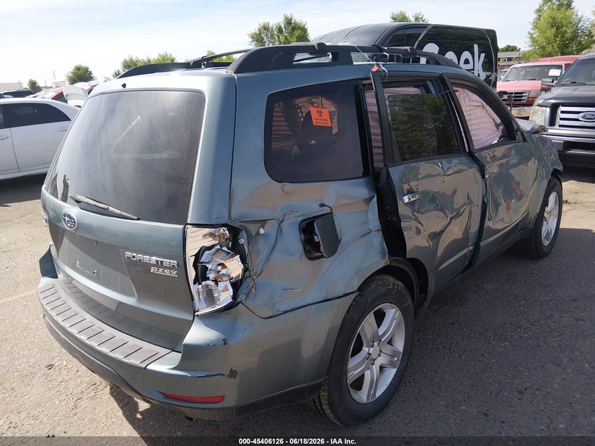 2010 Subaru Forester VIN JF2SH6CC6AG905864 IAAI salvage auction — NORMAL WEAR, Clear (Colorado), sold $375 on 2026-07-07 (photo 4)