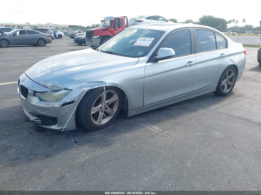 2014 BMW 3er VIN WBA3A5G57ENP29774 IAAI salvage auction — LEFT FRONT, Rebuildable (Florida), sold $875 on 2026-07-30 (photo 2)