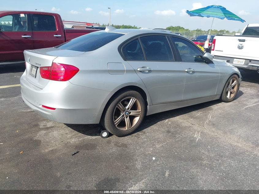 2014 BMW 3er VIN WBA3A5G57ENP29774 IAAI salvage auction — LEFT FRONT, Rebuildable (Florida), sold $875 on 2026-07-30 (photo 4)