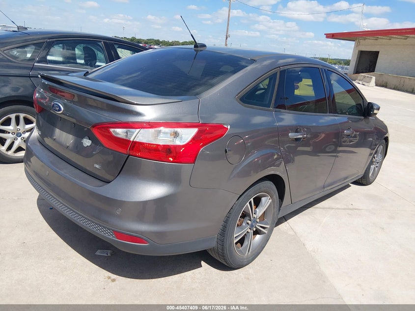 2014 Ford Focus VIN 1FADP3F25EL111114 IAAI salvage auction — NORMAL WEAR, Original (Texas), sold $600 on 2026-07-06 (photo 4)