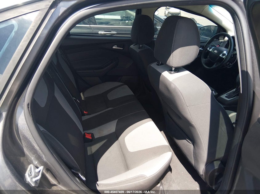 2014 Ford Focus VIN 1FADP3F25EL111114 IAAI salvage auction — NORMAL WEAR, Original (Texas), sold $600 on 2026-07-06 (photo 8)