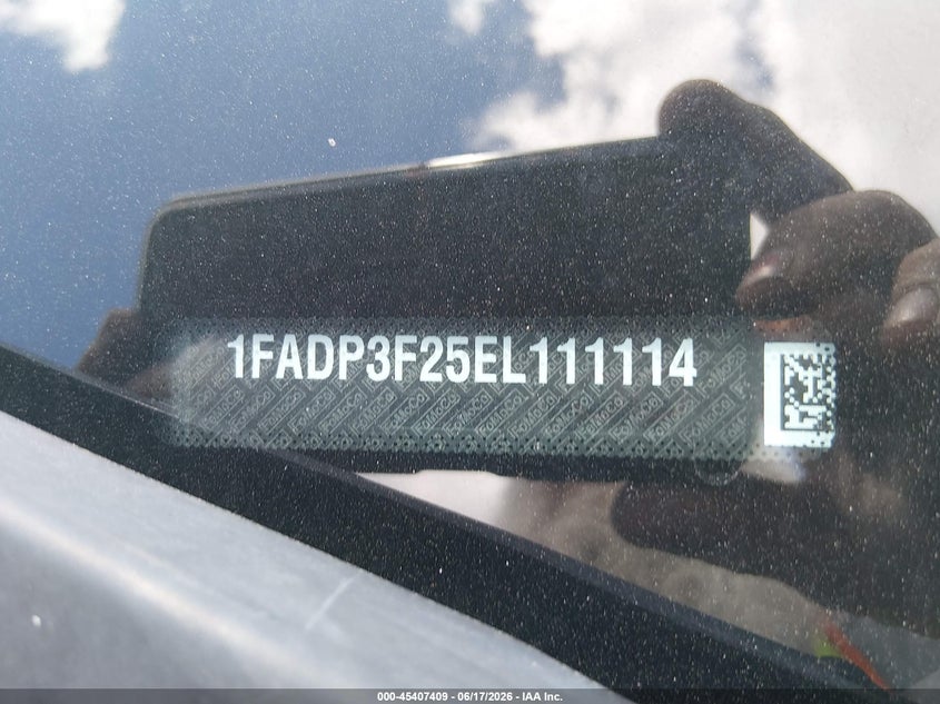 2014 Ford Focus VIN 1FADP3F25EL111114 IAAI salvage auction — NORMAL WEAR, Original (Texas), sold $600 on 2026-07-06 (photo 9)
