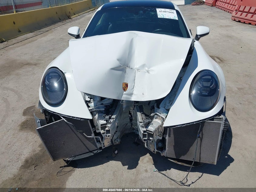 2023 Porsche 911 VIN WP0AB2A96PS220751 IAAI salvage auction — FRONT END, Wait Title, sold $57,000 on 2026-08-24 (photo 6)